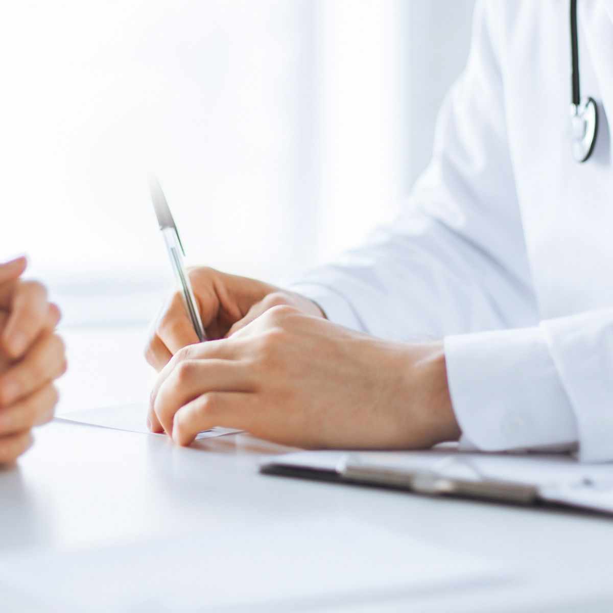 Doctor speaking with a patient at Makkah Clinic